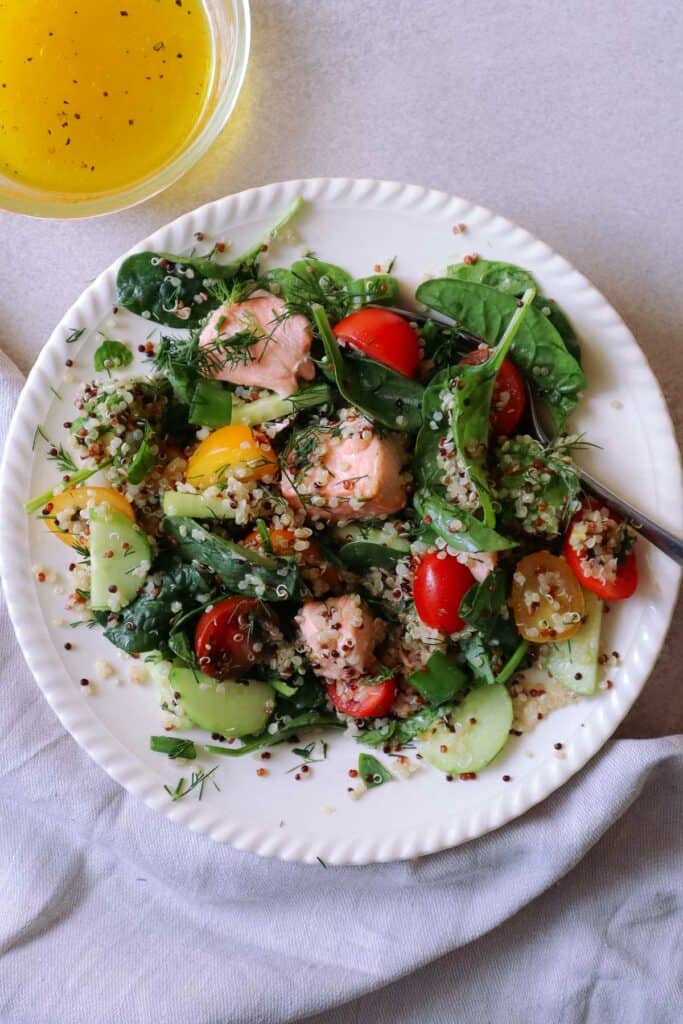 salmon quinoa salad on plate