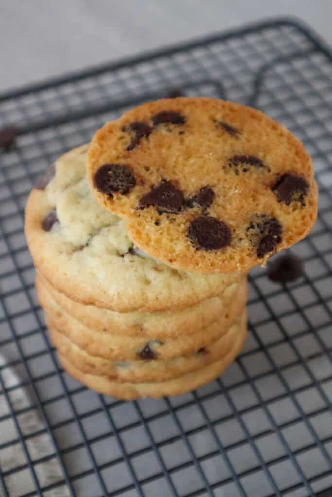 stack of chocolate chip cookies made without brown sugar with one cookie upside down