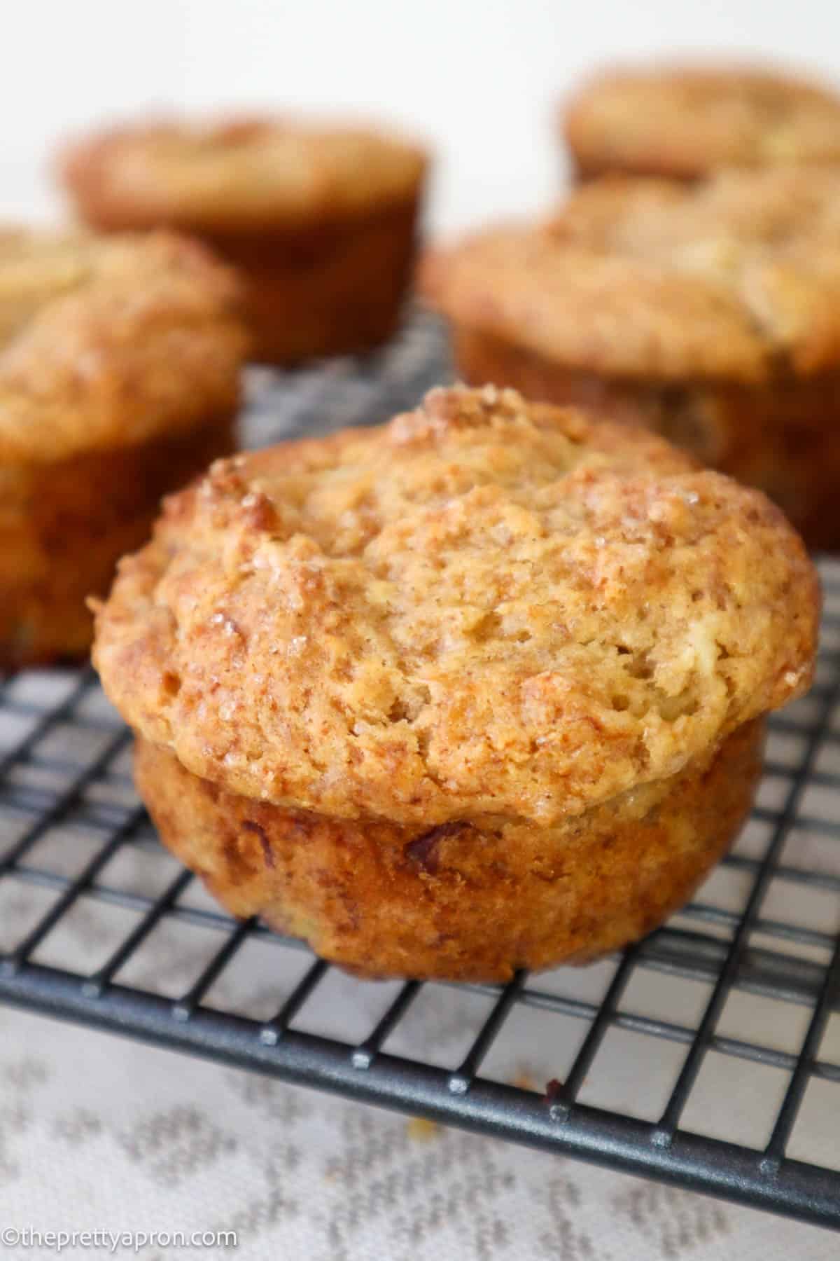 Five Banana cottage cheese muffins on cooling rack