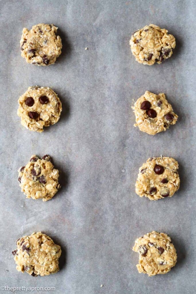 oatmeal chocolate chip cookie doough on a baking sheet
