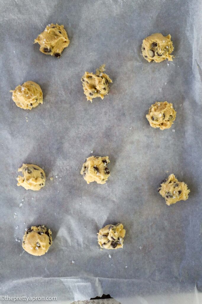 baking sheet with chocolate chip cookie dough balls