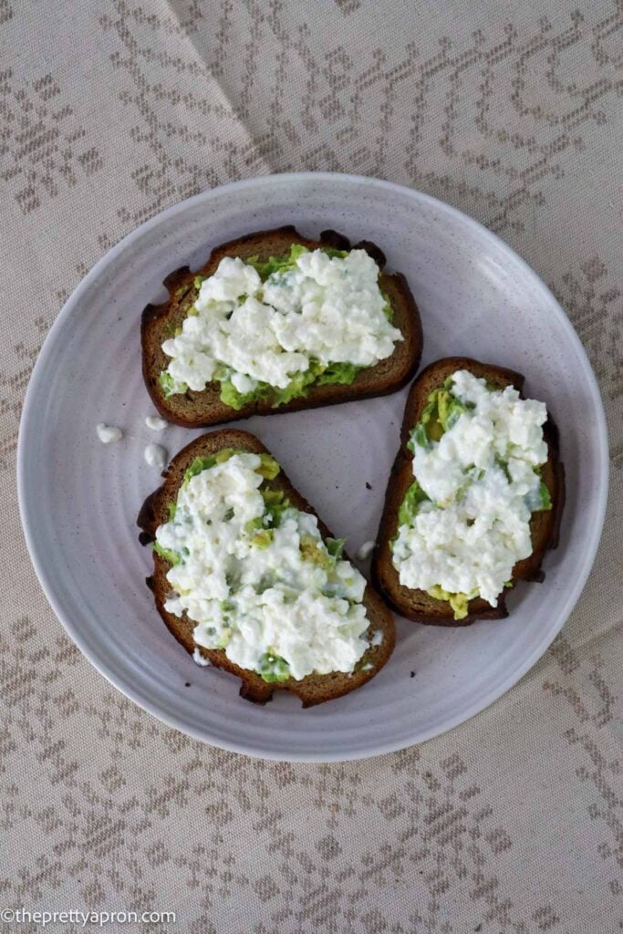 cottage cheese spread on top of avocado toasts