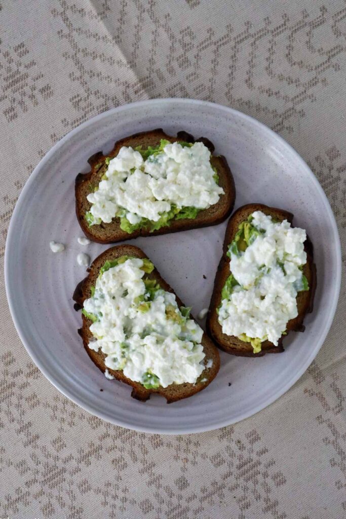 cottage cheese spread on top of avocado toasts