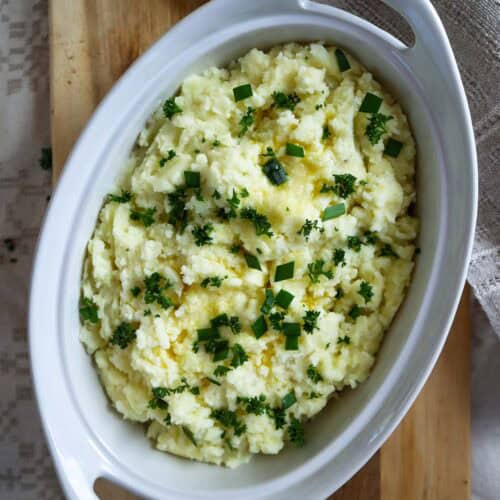 Mashed potatoes with cottage cheese, butter and fresh herbs.