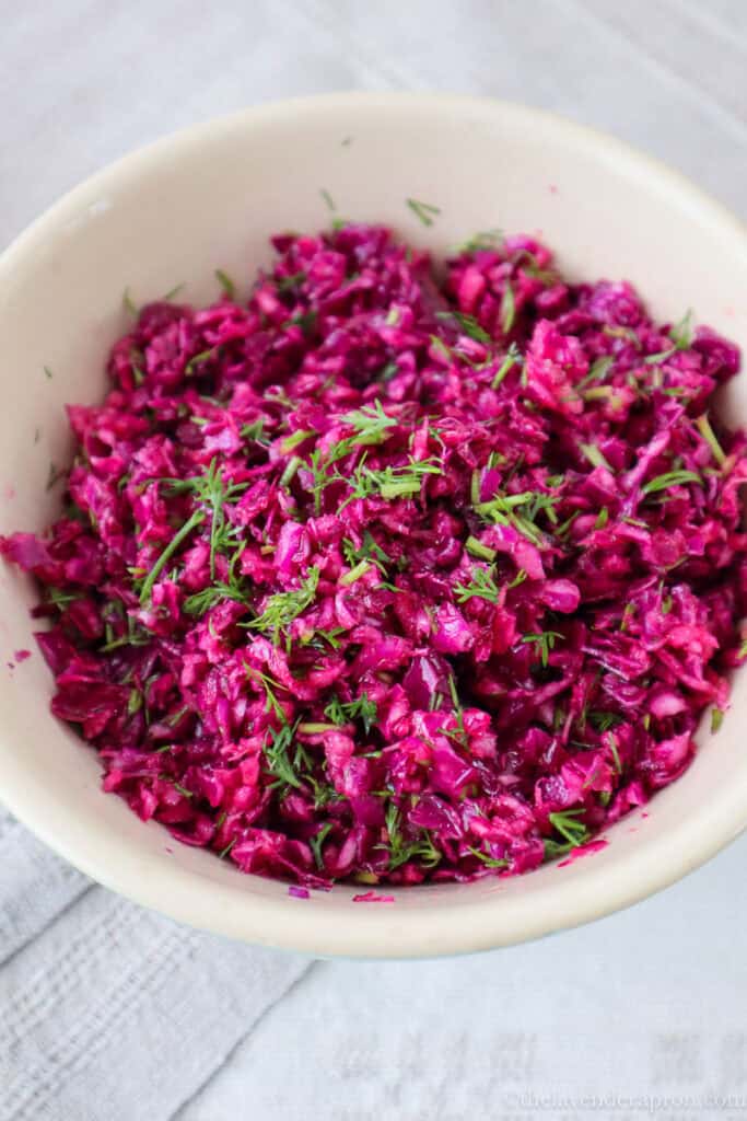 Close up of red cabbage salad in a bowl.