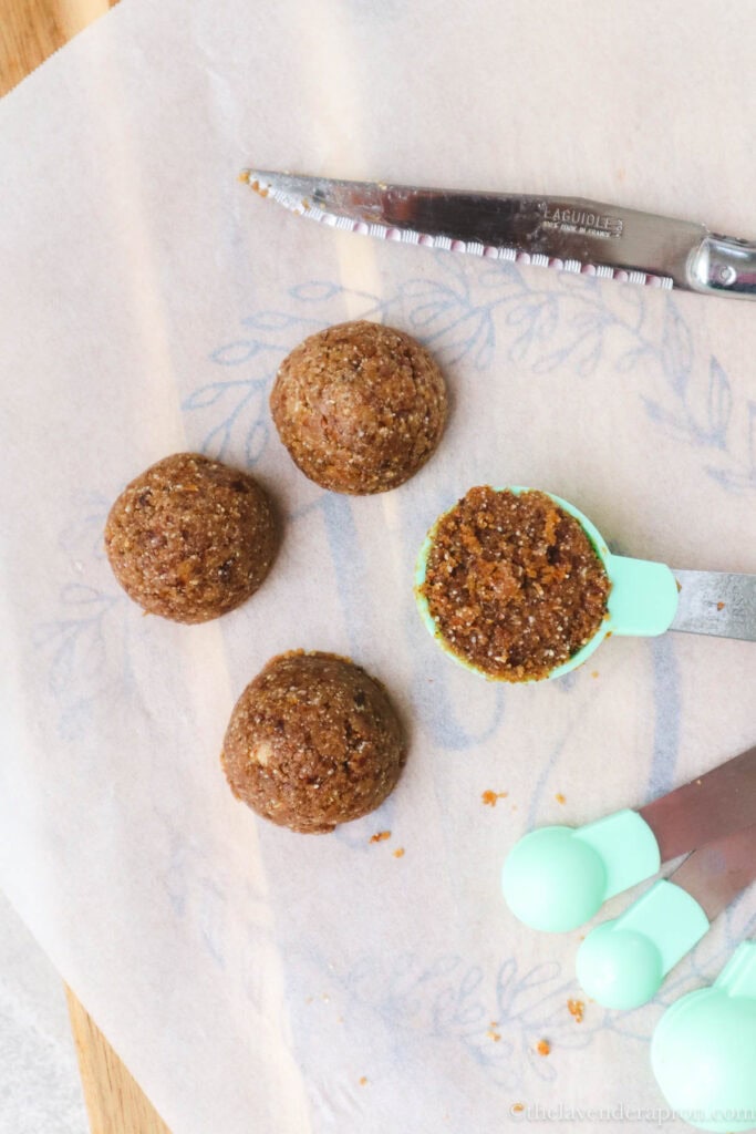 Using measuring spoons to make even sized balls and using a pointy small knife to get the mixture out of the measuring spoon.