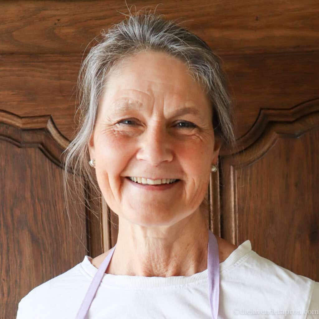 Marissa wearing a purple apron.