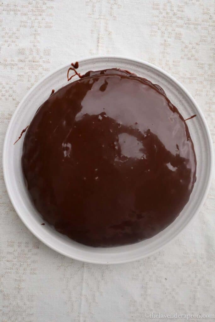 Belgian chocolate cake covered in Belgian dark chocolate ganache.