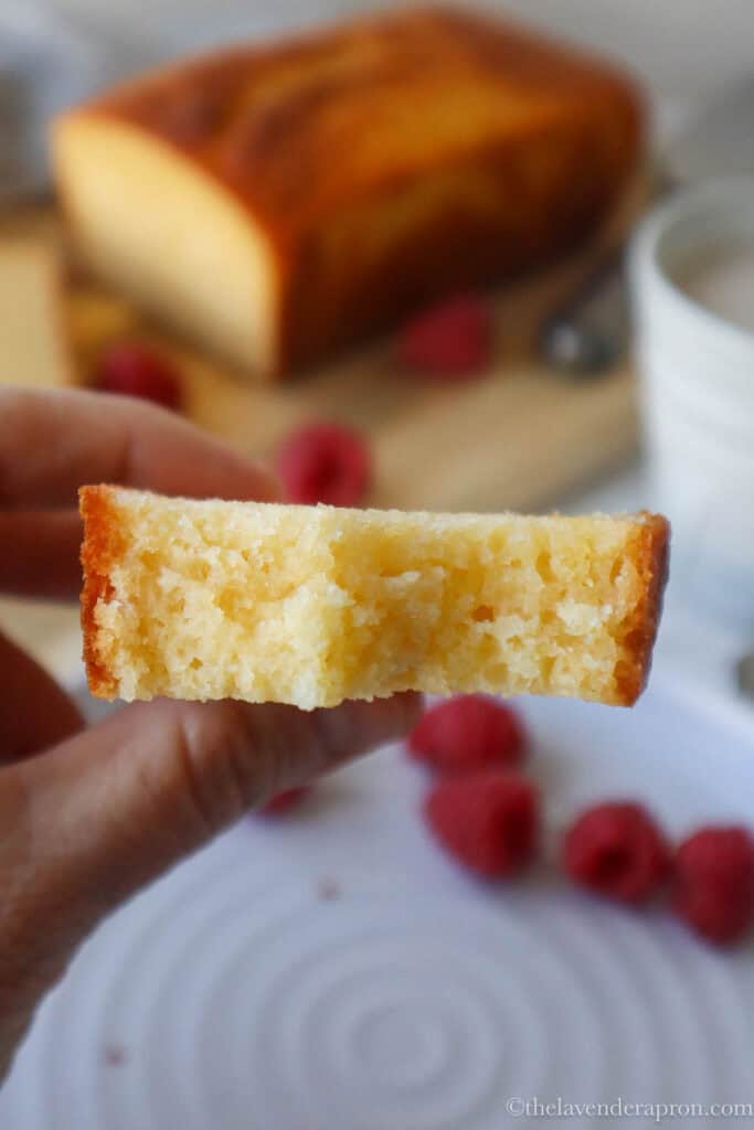 Slice of French yogurt cake showing side view.