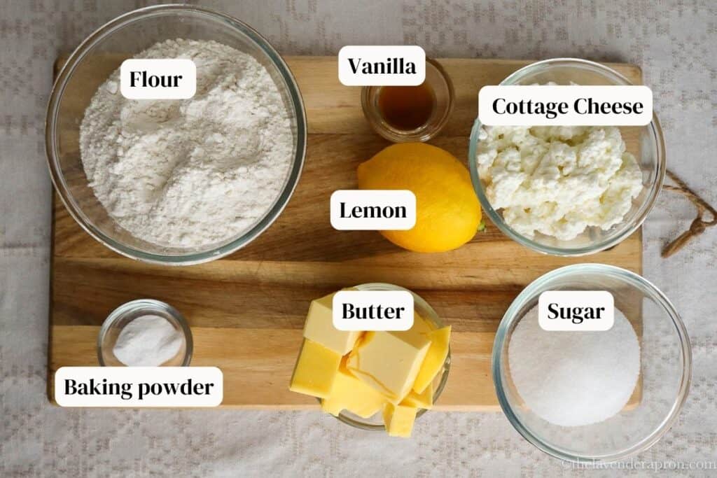 Ingredients for Latvian cottage cheese cookies laid out on a board.