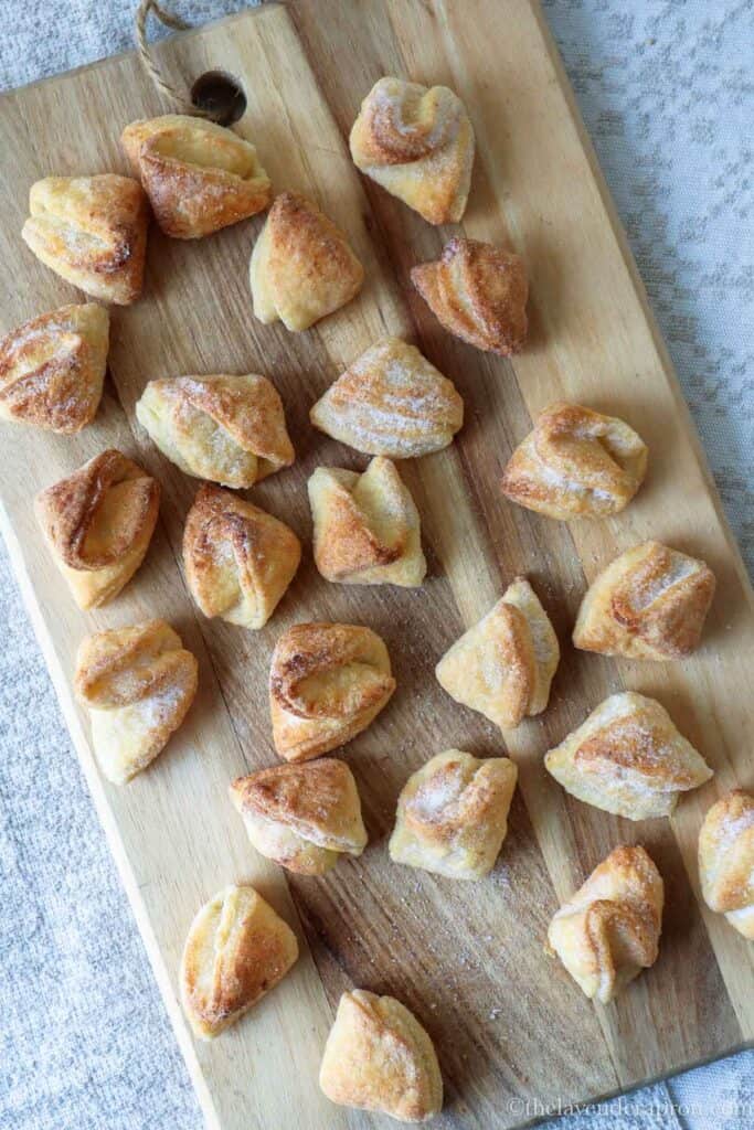 Finished biezpiena cepumi arranged on a wooden board.