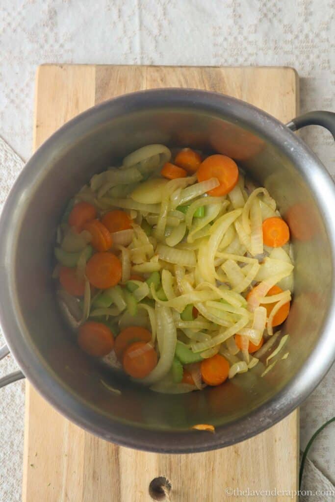 Mirepoix cooking in a pot.