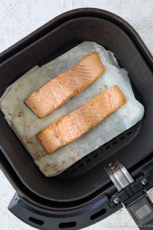Air frying fresh salmon.