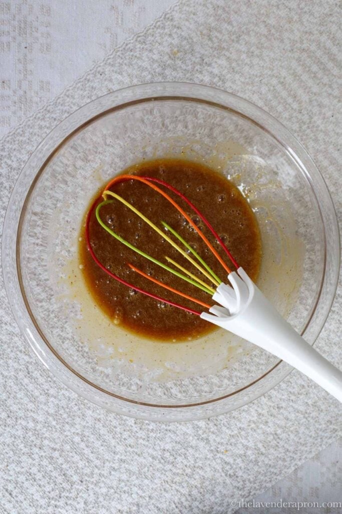 Glossy mixture of egg beaten into melted butter with sugar mixture.
